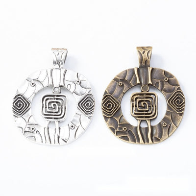 Round Embossed Geometric Metal Charm Pendant shown in the available visible finishes