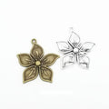Layered Five Petal Flower Charm in Two Antique Finishes view 1