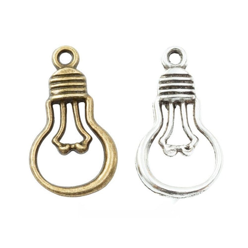 Openwork Light Bulb Metal Charms in Two Finishes in multiple metallic finishes displayed together on a white background.