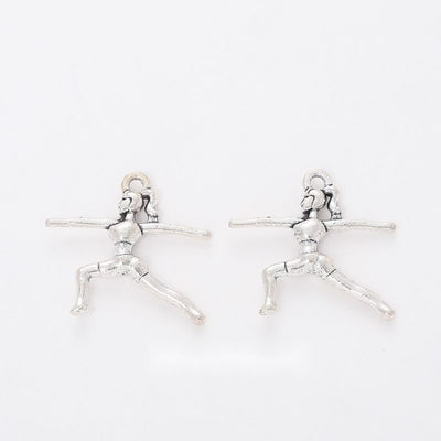Front display of the leaping gymnast in its pictured metal finishes