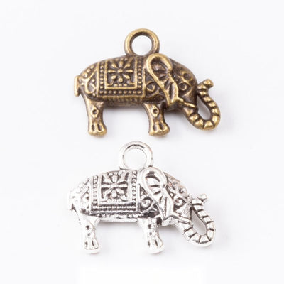 Walking elephant profile with a patterned blanket shown in the available finishes