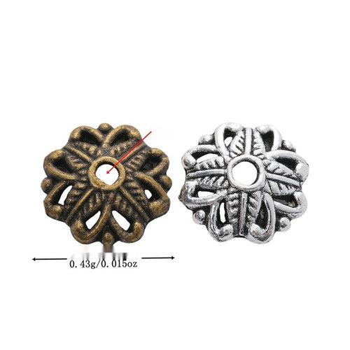 Openwork flower bead cap with layered geometric petals shown in arranged finish comparison