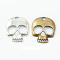 Flat Cutout Skull Metal Charms in Two Antique Finishes view 1