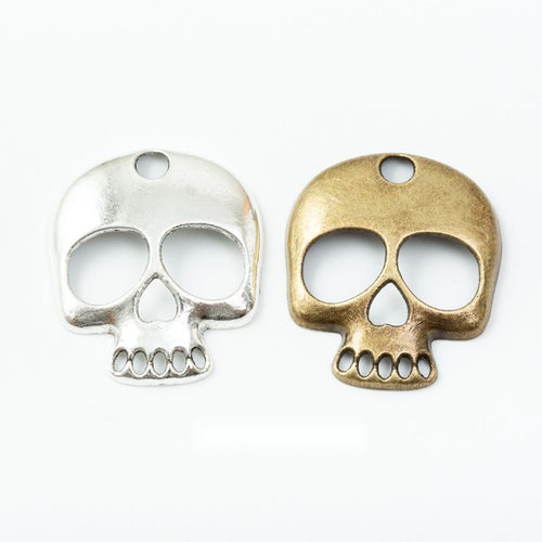 Flat Cutout Skull Metal Charms grouped product view on a white background