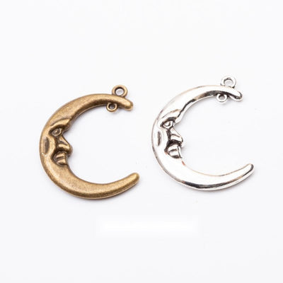 Front and finish comparison of crescent moon charm