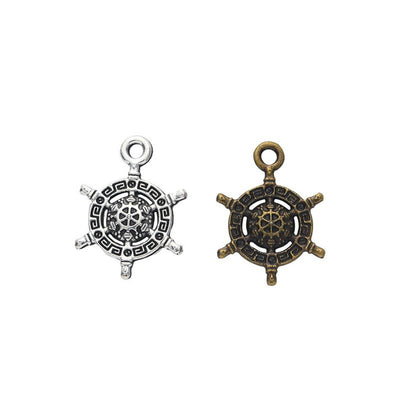 Product photo 1 of the patterned ship wheel charm highlighting its small ship wheel with geometric center pattern