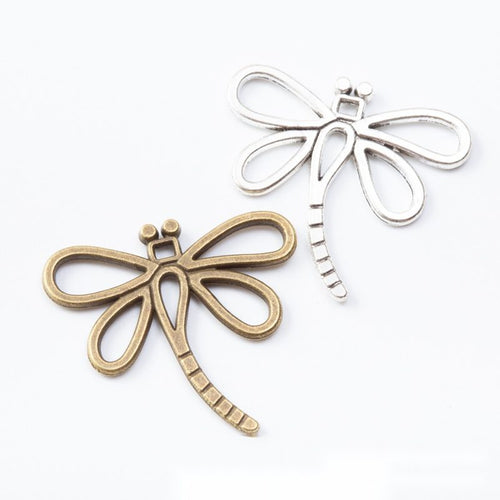Front and finish comparison of openwork dragonfly charm