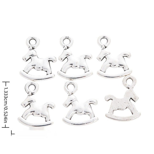 Product image showing the rocking horse metal charm and its visible metal details