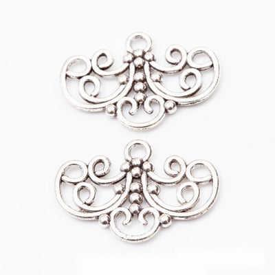 Product photo 1 of the scrollwork multi-loop bar connector highlighting its symmetrical scrollwork bar with side and low
