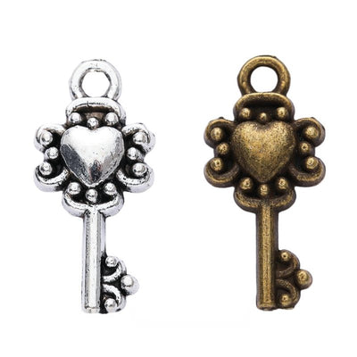 Ornate Heart Key metal piece shown in Antique Bronze, Antique Silver