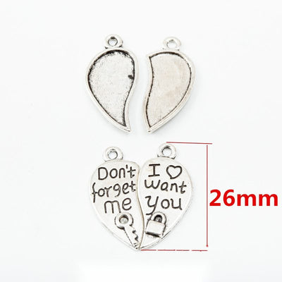 Group view of two complementary heart halves carry contrasting engraved messages