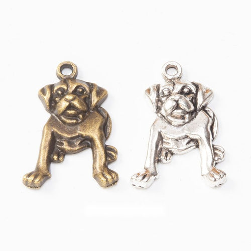 Sitting Bulldog Metal Charms in Two Antique Finishes in multiple metallic finishes displayed together on a white backgro