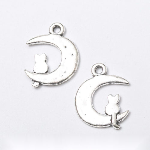 Front display of the cat crescent moon in its pictured metal finishes