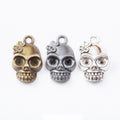 Side Facing Skull Metal Charm Pendant in Three Finishes view 1