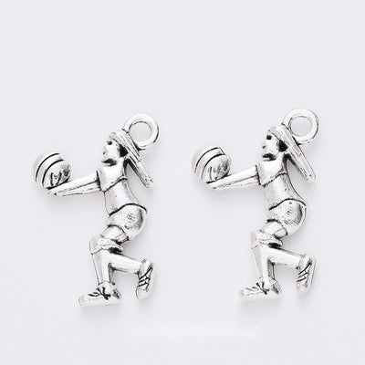 Grouped front view of volleyball girl charms in the available finishes