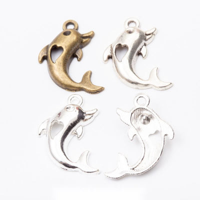 Dolphin charm shown across the available finishes