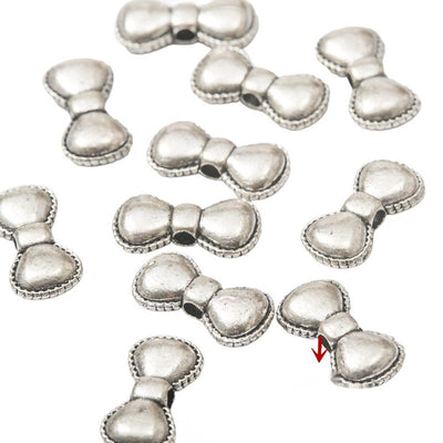 Antique Silver bow spacer bead shown in product image 1