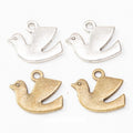 Flying Dove Silhouette Charm in Two Antique Finishes view 1