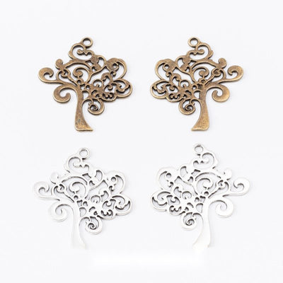 Scrollwork Tree metal pieces shown in the available finishes.