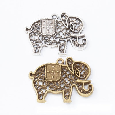 Filigree Elephant metal component, front grouping showing the available finishes.
