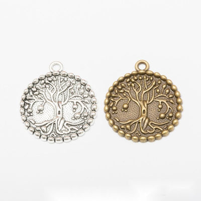 Ornate Tree of Life metal design group view on a light background