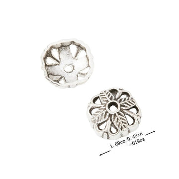 Openwork Flower Bead Cap with an open petal pattern around a center hole in Antique Silver