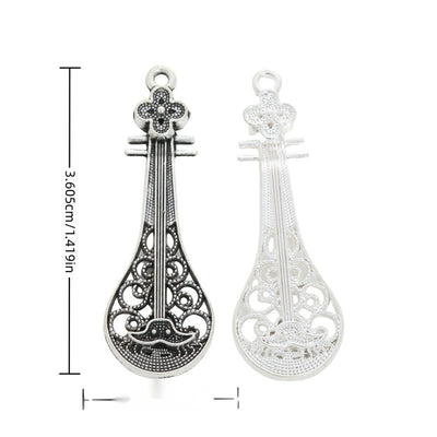 Filigree Guitar metal piece shown in Bright Silver, Antique Silver beside printed specifications