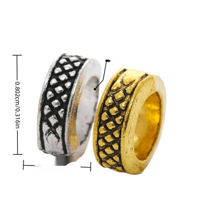 Grouped front view of ring spacer bead showing a wide center opening and darkened scale texture