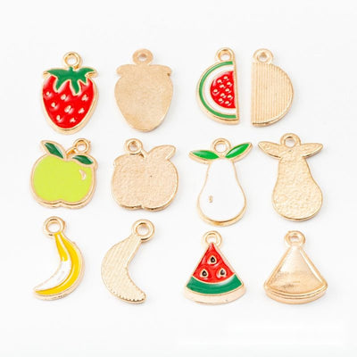 Grouped front view of fruit charm showing glossy colored enamel and gold-tone outlines