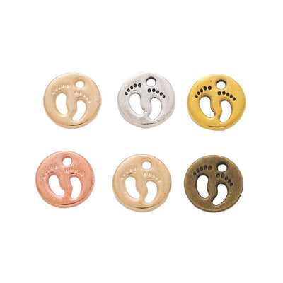 Footprint Disc metal component, front grouping showing the available finishes.