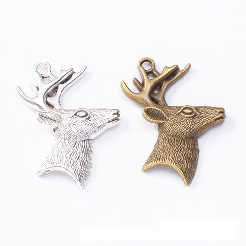 Grouped front view of the antlered deer head metal charm pendant in all pictured styles