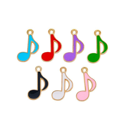 Musical note metal component, grouped front view on white