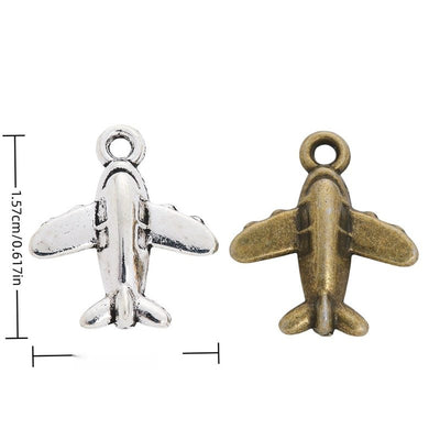 Product photo 1 of the three dimensional airplane charm highlighting its compact airplane with raised fuselage, wings, a