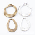 Irregular Open Circle and Teardrop Metal Charms in Two Antique Finishes view 1
