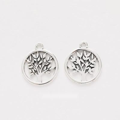 Overview of the tree of life charm in the available metal finishes