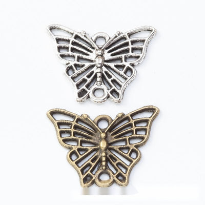 Openwork Butterfly Connector metal pieces shown in the available finishes.