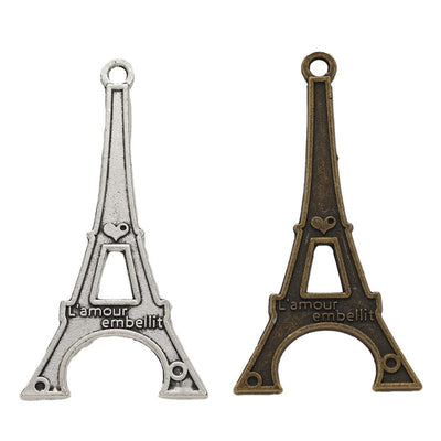 Group view of tall Eiffel Tower silhouette with embossed architectural details