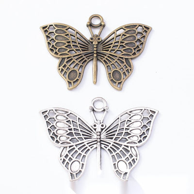 Grouped front views of openwork butterfly charms