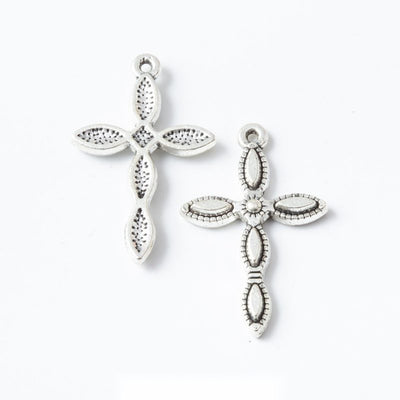 Grouped front views of leaf cross charms