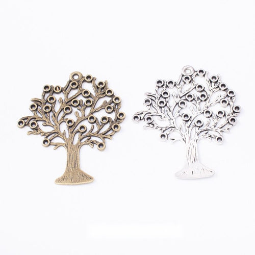 Group view of the tree charm showing the available finishes and front details