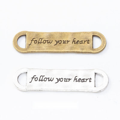 Follow Your Heart Bar Connector metal piece shown in product image 1