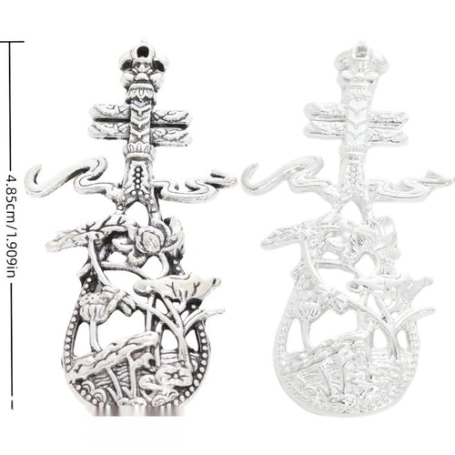 Bright Silver chinese dragon instrument charm shown in product image 1