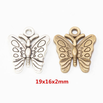 Butterfly with patterned wings and detailing on both sides shown in the available finishes