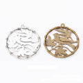 Round Flying Bird Cutout Charm in Two Antique Finishes view 1