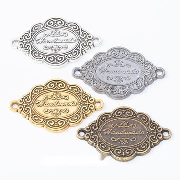 Ornate Oval Two Loop Bezel Connectors in Four Finishes
