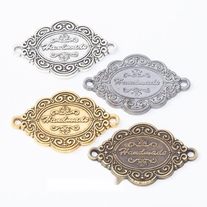 Ornate Oval Two Loop Bezel Connectors in Four Finishes