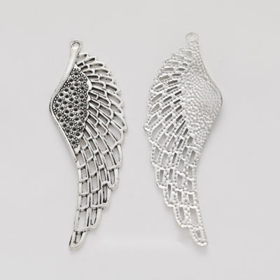 Detailed Feathered Wing Pendant Charm in Antique Silver shown in front and back product view