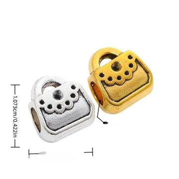 Handbag Large Hole Bead with a handbag shape with dotted flap detail in 2 Metal Finishes