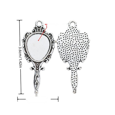 Ornate Hand Mirror Pendant Tray showing a decorative hand-mirror frame with a recessed oval tray