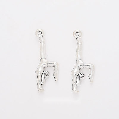 Front display of the handstand gymnast in its pictured metal finishes